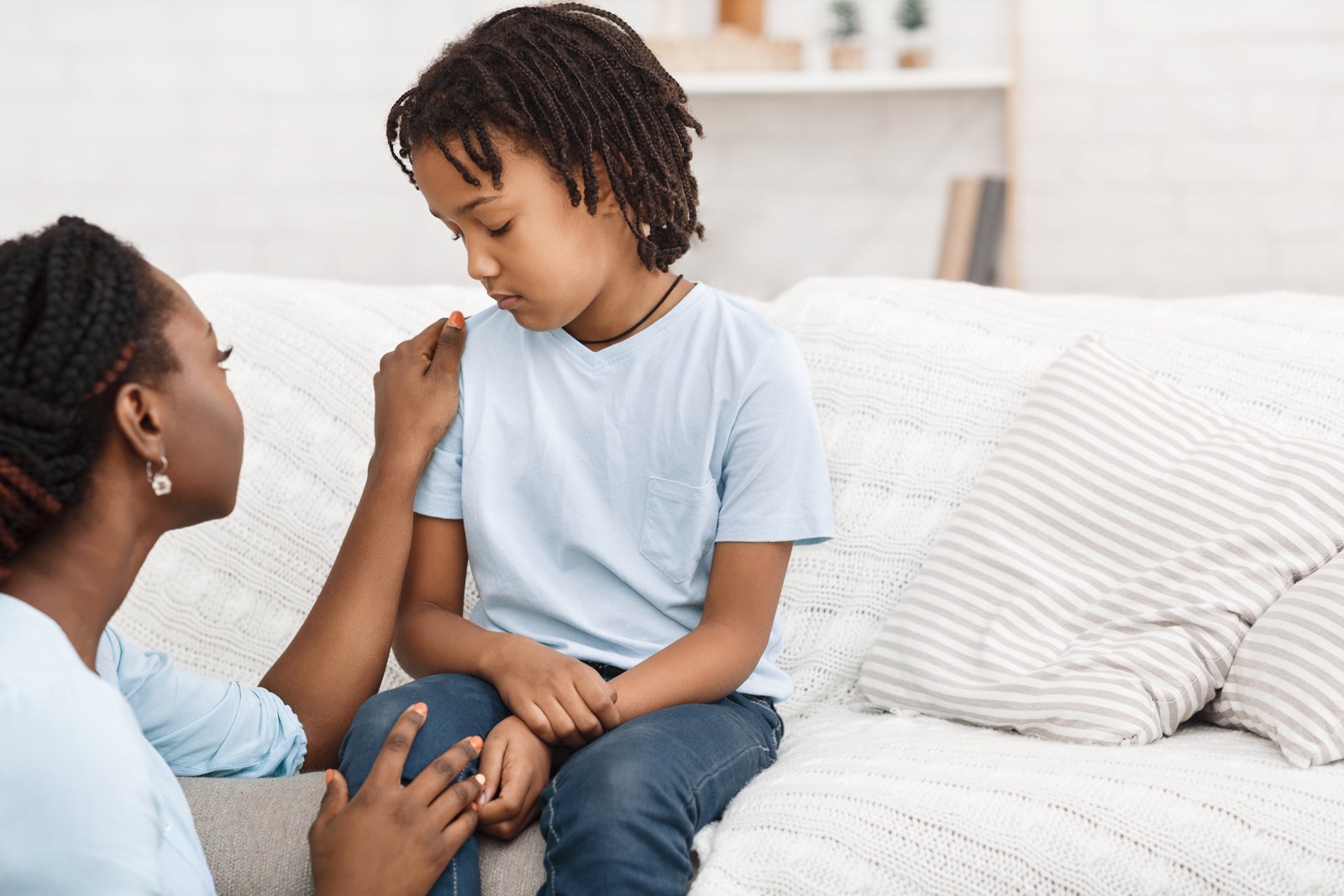 Caregiver supporting a child